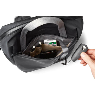 Bellroy Via Workpack open front pocket showing organized interior with key fob and pen holders