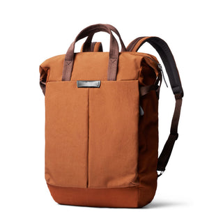 Bellroy Tokyo Totepack Compact in burnt orange with padded straps and recycled fabric texture