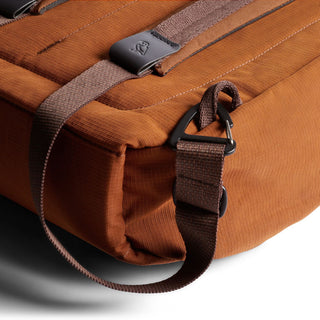 Bellroy Tokyo Totepack Compact in rust fabric with durable straps and metal carabiner attachment detail