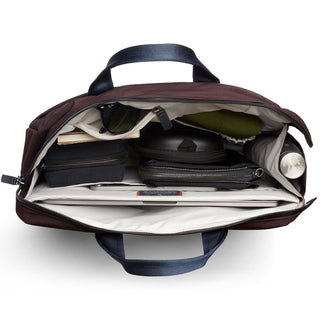 Bellroy Tokyo Work Bag open to show organized interior with multiple compartments and accessories inside