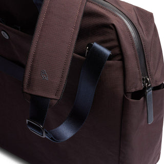 Bellroy Tokyo Work Bag in dark brown recycled fabric with padded strap and zipper detail close-up
