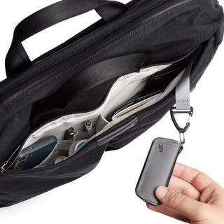 Bellroy Tokyo Work Bag in black showing organized interior compartments and attached key pouch detail