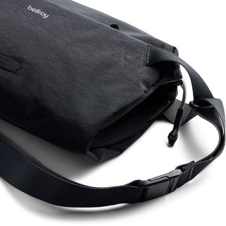 Bellroy Lite Sling in black showing durable fabric texture and adjustable strap with buckle detail