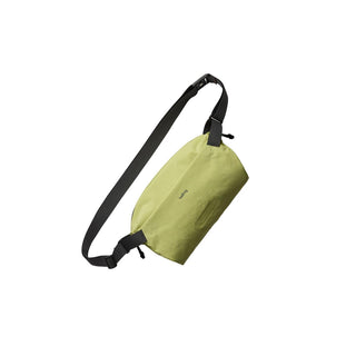 Bellroy Lite Sling crossbody bag in olive green made from durable recycled materials with adjustable strap
