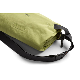 Bellroy Lite Sling bag in muted green with durable water-resistant fabric and adjustable black strap