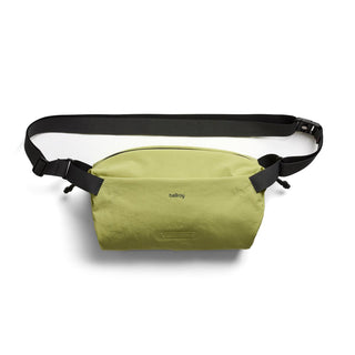 Bellroy Lite Sling in light green with black adjustable strap made from recycled water-resistant fabric