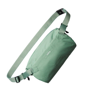 Bellroy Lite Sling in green, durable water-resistant fabric with adjustable strap and sleek design