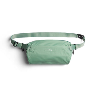 Bellroy Lite Sling in muted green with durable water-resistant fabric and adjustable strap