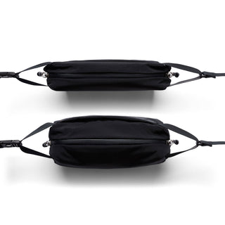 Bellroy Lite Sling Mini showing slim black crossbody bag with water-resistant fabric and zippered pockets