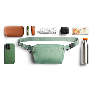 Bellroy Lite Sling Mini in green, compact crossbody bag with durable recycled fabric and buckle straps