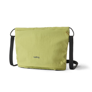 Bellroy Lite Sacoche crossbody bag in light green recycled fabric with black adjustable strap