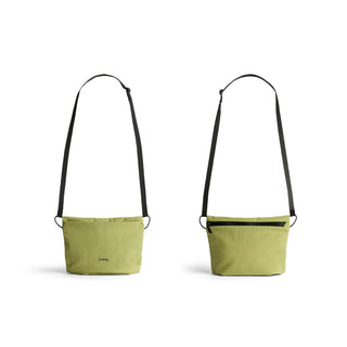Bellroy Lite Sacoche in light green recycled fabric with adjustable black strap, front and back views visible