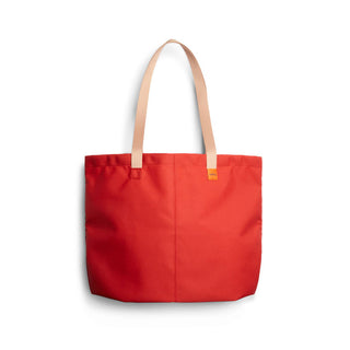 Bellroy Market Tote in bright red with natural beige handles made from recycled nylon fabric