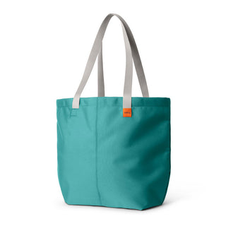 Bellroy Market Tote in teal recycled nylon with beige handles and a small orange logo tag