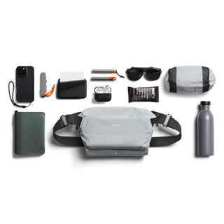 Bellroy Venture Sling 6L in light gray recycled fabric with adjustable black straps and front pockets