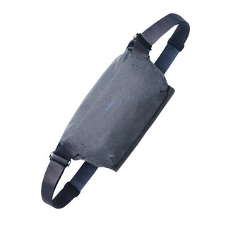Bellroy Venture Sling 6L in dark grey fabric with adjustable black strap shown at an angled view