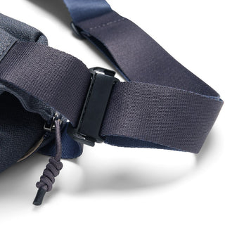 Bellroy Venture Sling 6L featuring navy blue adjustable strap with secure black buckle detail close-up