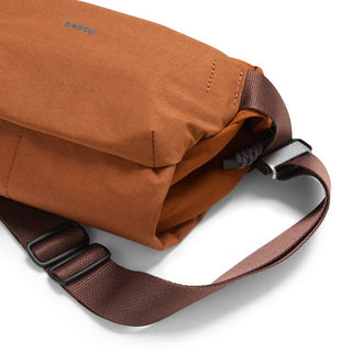 Bellroy Venture Sling 6L in brown with durable fabric and adjustable dark brown strap close-up view