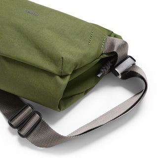 Bellroy Venture Sling 6L in olive green with adjustable gray strap and minimalist design details