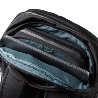 Bellroy Transit Workpack Pro 22L black backpack showing padded laptop compartment and blue interior lining