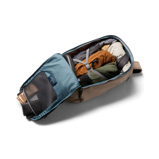 Bellroy Transit Workpack Pro 22L backpack open with neatly packed clothes inside showing interior compartments