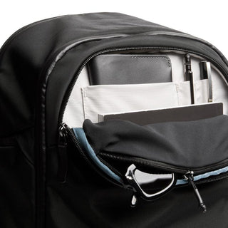 Bellroy Transit Workpack Pro 28L front pocket showing organized storage with black recycled fabric design