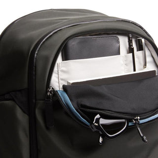 Bellroy Transit Workpack Pro 28L in black with organized front pocket holding glasses and stationery
