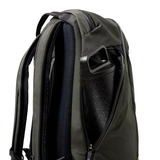 Bellroy Transit Workpack Pro 28L in dark green showing side pocket with water bottle and padded straps