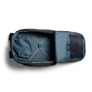 Bellroy Transit Workpack Pro 28L open showing spacious interior with blue fabric and cross straps
