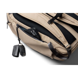 Bellroy Transit Workpack Pro 28L beige backpack side pocket with phone and key fob detail