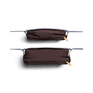 Bellroy Sling Mini Premium - 7L in dark brown nylon showing front and side zipper details with leather pull tabs