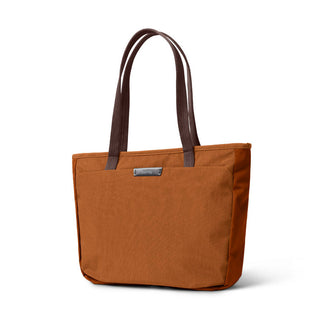 Bellroy Tokyo Tote Compact in burnt orange with durable textured fabric and dark brown handles