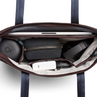 Bellroy Tokyo Tote Compact showcasing organized interior compartments with tech accessories inside