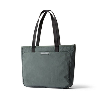Bellroy Tokyo Tote Compact in muted green woven fabric with black handles and front pocket detail