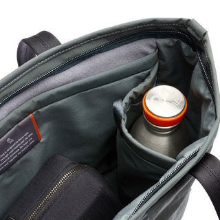 Bellroy Tokyo Tote Compact open showing durable fabric interior with water bottle and zippered pouch compartments