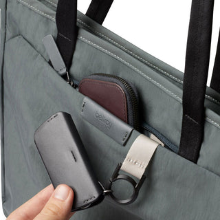 Bellroy Tokyo Tote Compact in gray woven fabric with front pocket and leather key holder detail