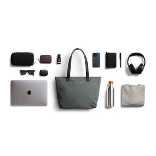 Bellroy Tokyo Tote Compact with water-resistant fabric and black handles shown with daily essentials arranged neatly