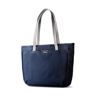 Bellroy Tokyo Tote Compact in navy woven fabric with light grey handles and metal logo badge