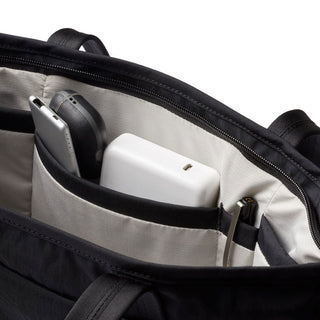 Bellroy Tokyo Tote Compact interior with organized pockets holding tech accessories and essentials