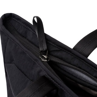 Bellroy Tokyo Tote Compact in black water-resistant fabric with zipper closure and sturdy woven texture