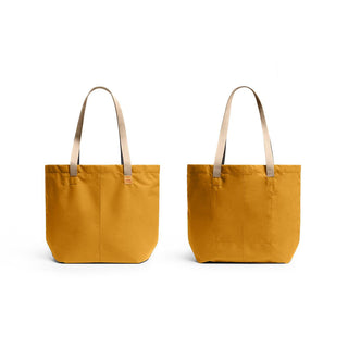 Bellroy Market Tote in mustard yellow recycled nylon with beige handles shown from front and back angles