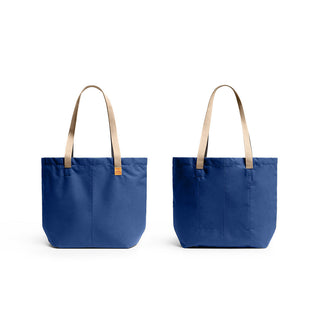 Bellroy Market Tote in navy blue recycled nylon with beige handles shown from front and back angles