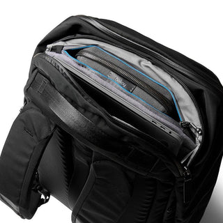 Bellroy Transit Backpack Plus in black showing padded laptop compartment and interior organization pockets