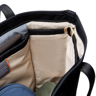 Bellroy Tokyo Tote Second Edition showing spacious inner compartments with soft beige fabric lining and black exterior