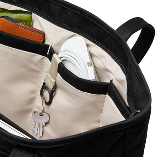 Bellroy Tokyo Tote Second Edition black interior organization pockets with keys and charger cable inside