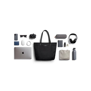 Bellroy Tokyo Tote Second Edition in black with soft fabric and spacious interior shown with tech and travel essentials