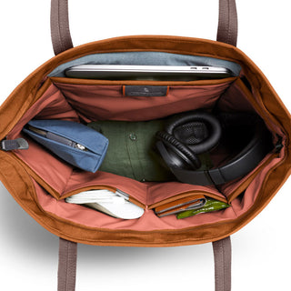Bellroy Tokyo Tote Second Edition showing organized interior with laptop, headphones, and multiple compartments