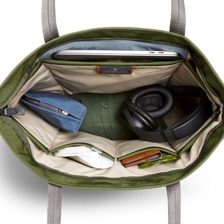Bellroy Tokyo Tote Second Edition in green showing organized interior with laptop pocket and accessories inside