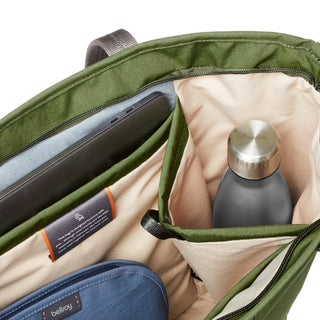 Bellroy Tokyo Tote Second Edition showing organized interior with padded laptop and bottle pockets in green fabric