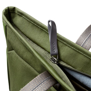 Bellroy Tokyo Tote Second Edition in olive green canvas with leather zipper pull and sturdy handles close-up